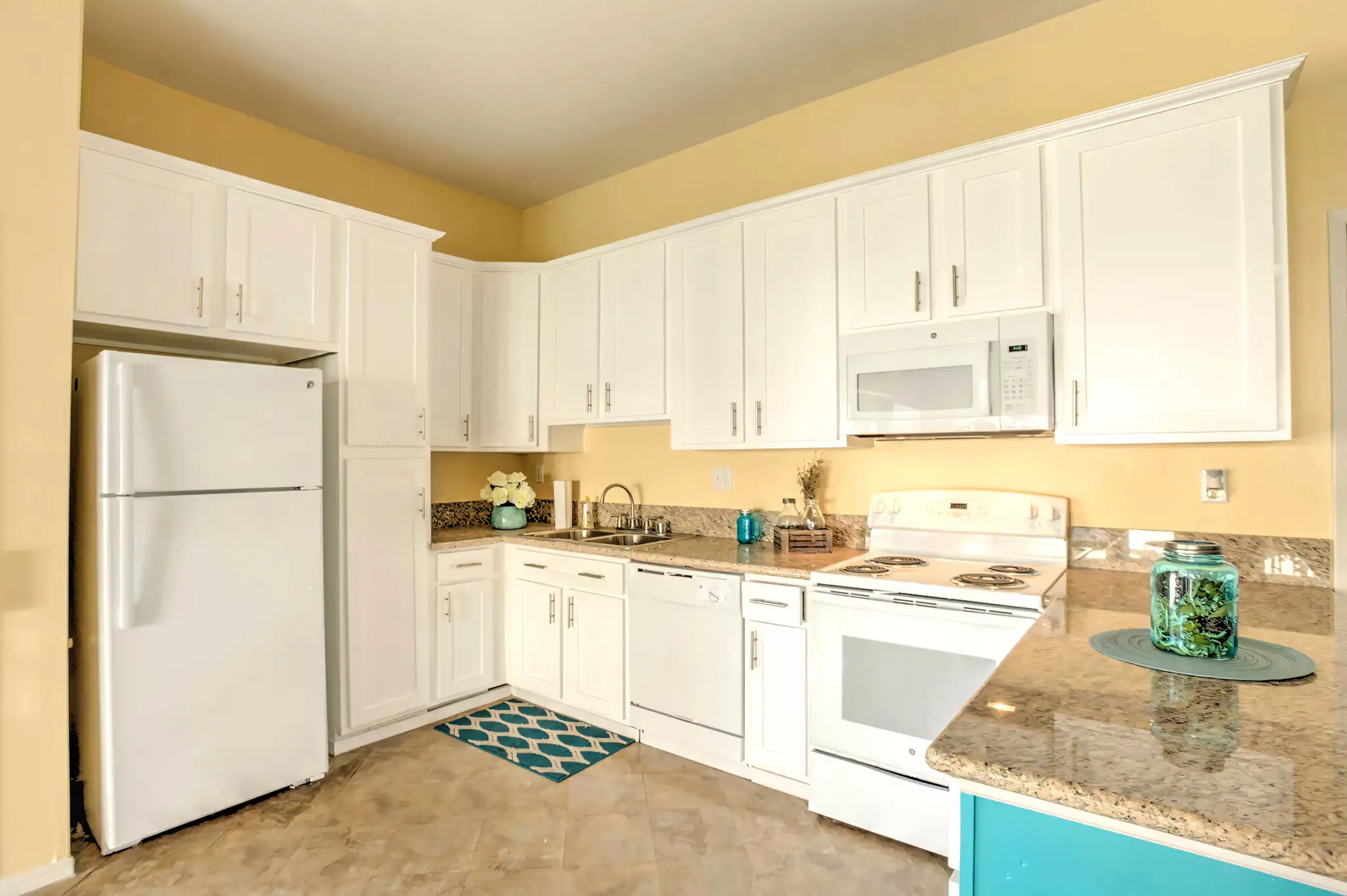 Shadow Mountain Apartments kitchen with white appliance package